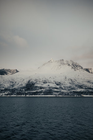 Snowy mountain in the Lyngen Alps in northern Norway in winterの写真素材