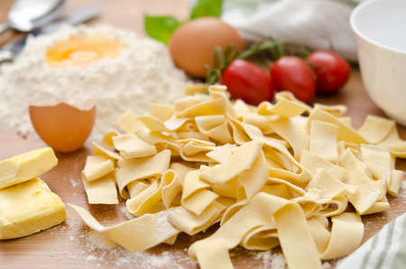 Ingredients for tagliatelle with tomato sauceの写真素材