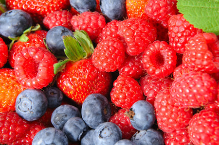 Assorted seasonal berries including blueberry, strawberry and raspberry