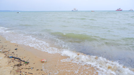 Natural Scenery Of Tidal Waves Crashing On Tanjung Kalian Beach, Indonesiaの写真素材