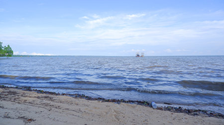 Natural View Of Small Tidal Waves Of Sea Water On The Tropical Beach Of Belo Laut Village, Indonesia