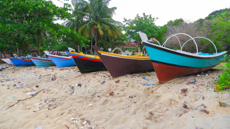 Row Of Fishing Boats On The Coast Of Tanjung Kalian, Indonesiaの写真素材