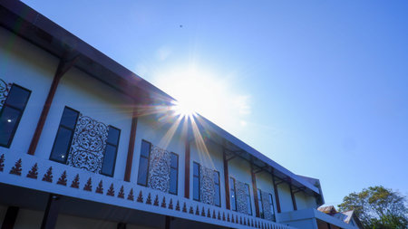 Morning Sunlight Rising Above A Roof Of A Multipurpose Building In The Morning