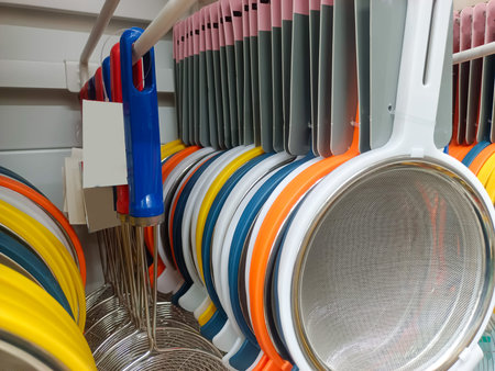Kitchen Equipment That Filters Or Drains Water From Food, Which Is Arranged And Hung In A Minimarket