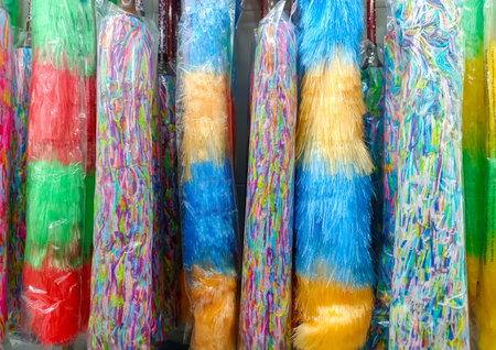 Duster Or Dust Cleaner, With Various Colors In Plastic Packaging And Hung Neatly