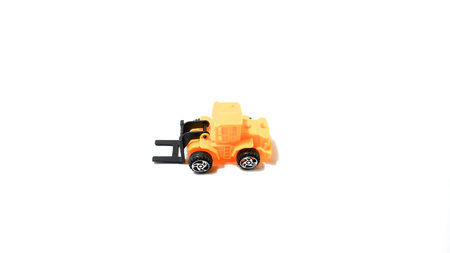 Orange Toy Forklift for Kids on Isolated White Background