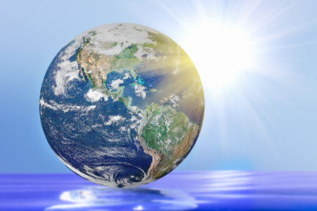 globe with bright highlights on a blue background  Elements of this image furnished by NASA