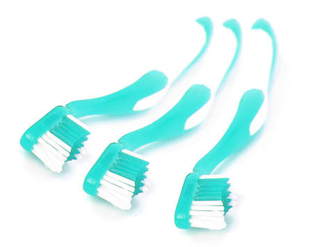 azure dental brush on white backgroundの写真素材