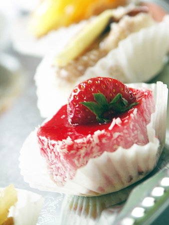 small sweet tarts with fresh fruitの写真素材
