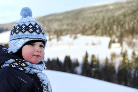 portrait small boy in winter on mountains Krkonoseの写真素材