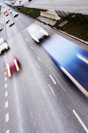 Highway with lots of cars. High contrast and motion blur to rise speed.の写真素材