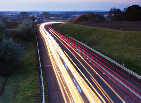 Highway at night with cars lights