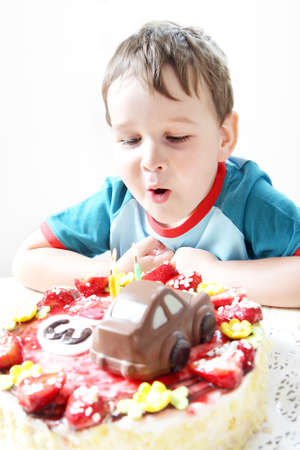 Birthday party celebration sweet cake food three candlesの写真素材