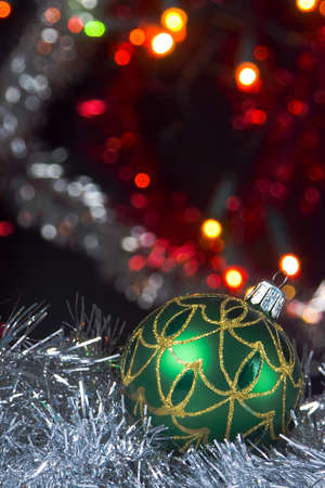 Christmas decoration - green ball with abstract backgroundの写真素材