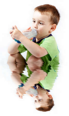 Little boy using inhaler for asthma isolated on white with reflection on waterの写真素材
