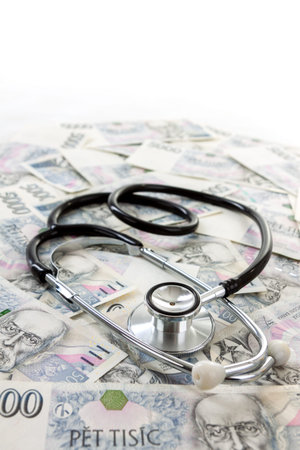 Czech paper money with heart on white background - stethoscope, heart, czech money 5000 and 1000の写真素材