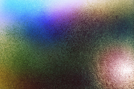 multi-colored texture of drops on glass