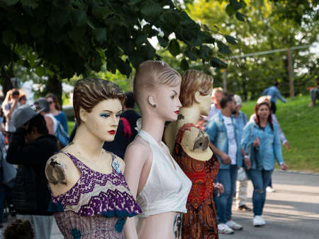 MUNICH, GERMANY - AUGUST 20, 2017: Three mannequin with colorfulのeditorial素材