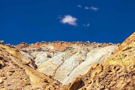 rocky mountains in the desert on a sunny day with blue sky and clouds in the USA in utah