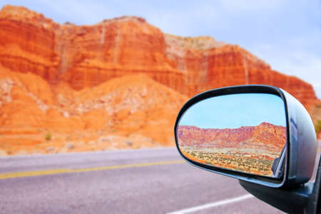 looking back in the car's rearview mirror the Capitol Reef Rocky Mountains near escalante utah on route 12 in the united statesの写真素材