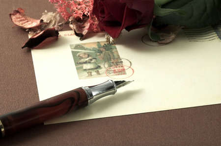 romance vintage postcard and red rose