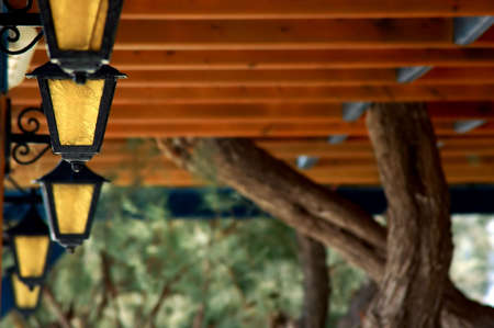 greek restaurant lighting yellow glass and black metalの写真素材