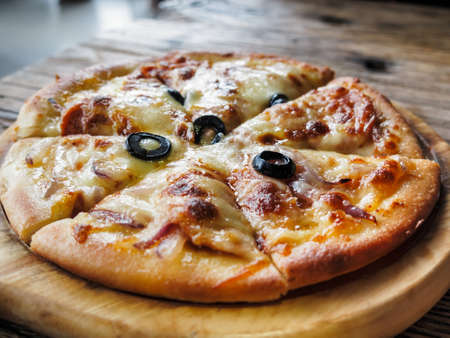 Pizza on the plate crust closeupの写真素材