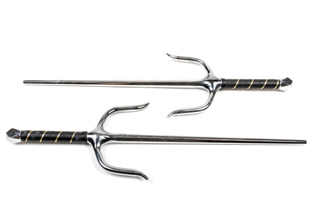 A Pair of Sai on a white background