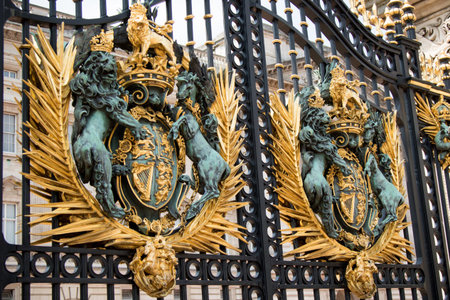 London, United Kingdom - June 5th, 2016: The UK Royal Coat of Arms on the gates of Buckingham...