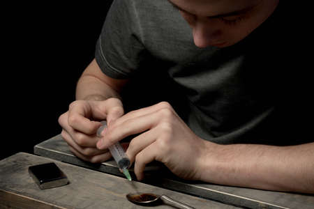 About to take drugsの写真素材