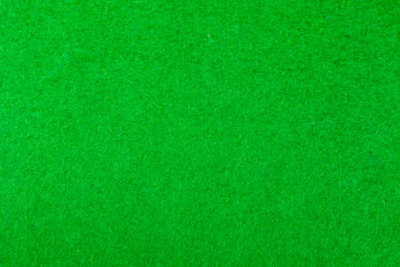 Green felt of a card tableの写真素材