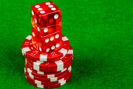 Stack of gambling chips and dice