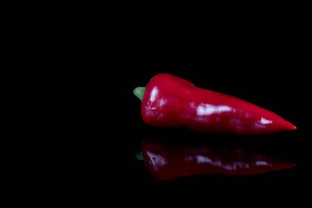 Jalapeno peppers isolated on a black backgroundの写真素材