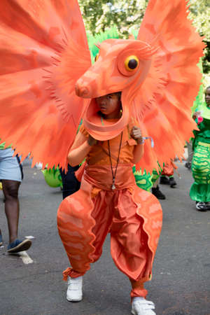 London, United Kingdom - August 27, 2017. Notting Hill Carnival one of the largest street parties in Europe is now in its 51st year. This year was close to the ruin of Grenfell Tower scene of a devastaing fire.のeditorial素材
