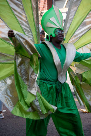 London, United Kingdom - August 27, 2017. Notting Hill Carnival one of the largest street parties in Europe is now in its 51st year. This year was close to the ruin of Grenfell Tower scene of a devastaing fire.のeditorial素材