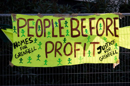 London, United Kingdom - August 27, 2017. Notting Hill Carnival one of the largest street parties in Europe is now in its 51st year. This year was close to the ruin of Grenfell Tower scene of a devastaing fire.のeditorial素材