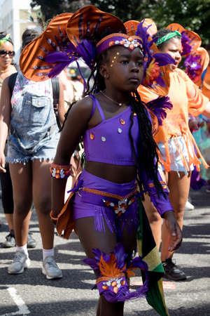 London, United Kingdom - August 27, 2017. Notting Hill Carnival one of the largest street parties in Europe is now in its 51st year. This year was close to the ruin of Grenfell Tower scene of a devastaing fire.のeditorial素材