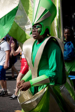 London, United Kingdom - August 27, 2017. Notting Hill Carnival one of the largest street parties in Europe is now in its 51st year. This year was close to the ruin of Grenfell Tower scene of a devastaing fire.のeditorial素材