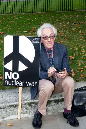 London, 28th September 2017:- Protesters gather in Whitehall, opposite Downing Street, to protest the growing tensions between North Korea and the USAのeditorial素材