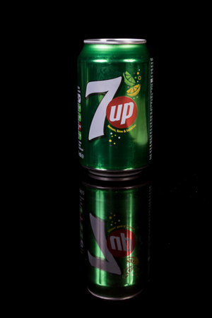 London, 24th October 2017:- A can of 7 Up isolated on a black background