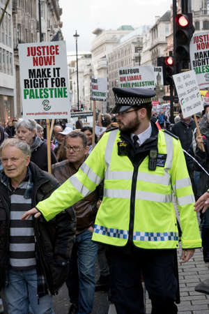 4th November 2017, London, United Kingdom:-Pro Palestine demonstrators march through London against the Balfour declaration of 1917 and the on going Israeli occupationのeditorial素材