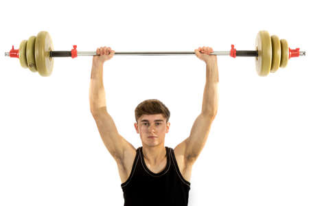 18 year old teenage boy doing exerciseの写真素材