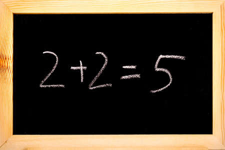 Blackboard with 22=5 written on in white chalk.の写真素材