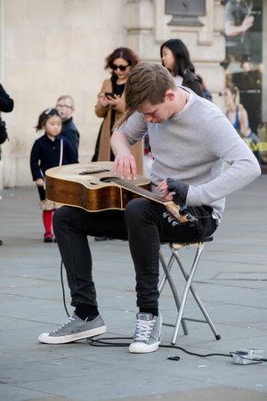 London, United Kingdom, 18th Febuary 2018:- A street perfomer perfoming as part of the festivities...