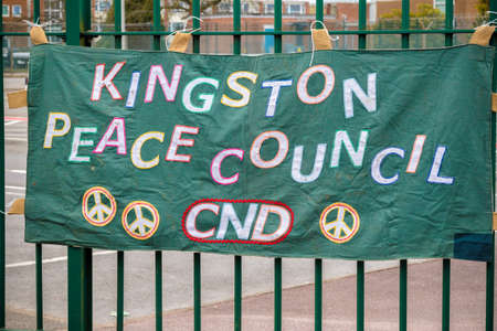 Aldermaston, United Kingdom, 1st April 2018:- CND protesters gather outside the main gate to the AWE where Britainâs nuclear warheads are made, on the 60th anniversary of the first CND march in 1958のeditorial素材