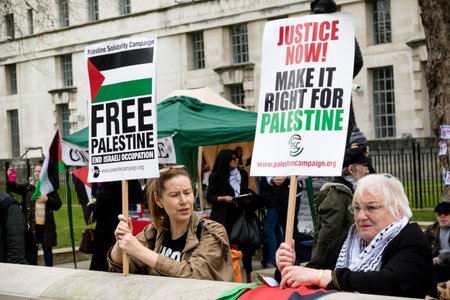 London, United Kingdom, 7st April 2018:- Protesters gather outside Downing Street in London to...