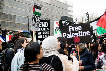London, United Kingdom, 7st April 2018:- Protesters gather outside Downing Street in London to protest the recent killings of Palestinians in Gaza by the Israeli  army during of the Great Return Marchのeditorial素材
