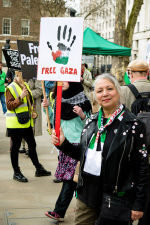 London, United Kingdom, 7st April 2018:- Protesters gather outside Downing Street in London to...