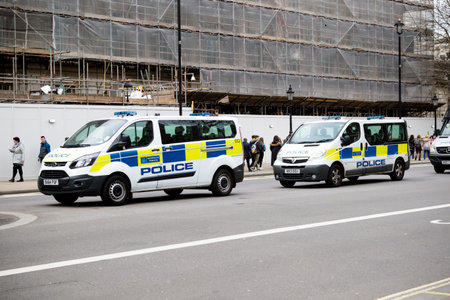 London, United Kingdom, 7st April 2018:- Police vans parked in Whitehall near Downing Street close...