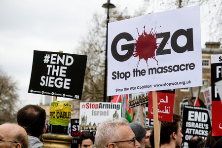 London, United Kingdom, 7st April 2018:- Protesters gather outside Downing Street in London to...
